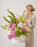 Fresh flower arrangement by FSMIA featuring pink carnations white daisies and green foliage with floral fragrance for women