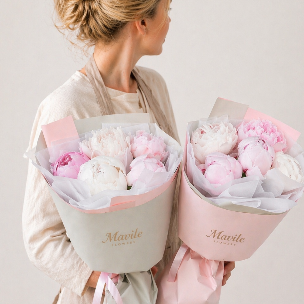 Fresh flower arrangement by FSMIA with pink and white peonies in sg pure elegant wrapping