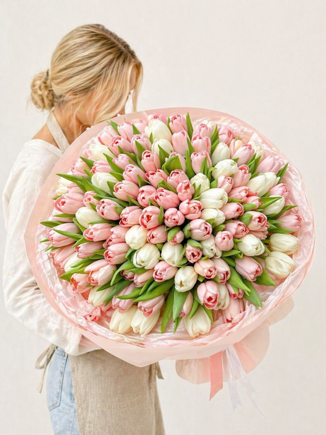 Large bouquet of pink and white tulips by FSMIA designed to pierce veil with its vibrant beauty
