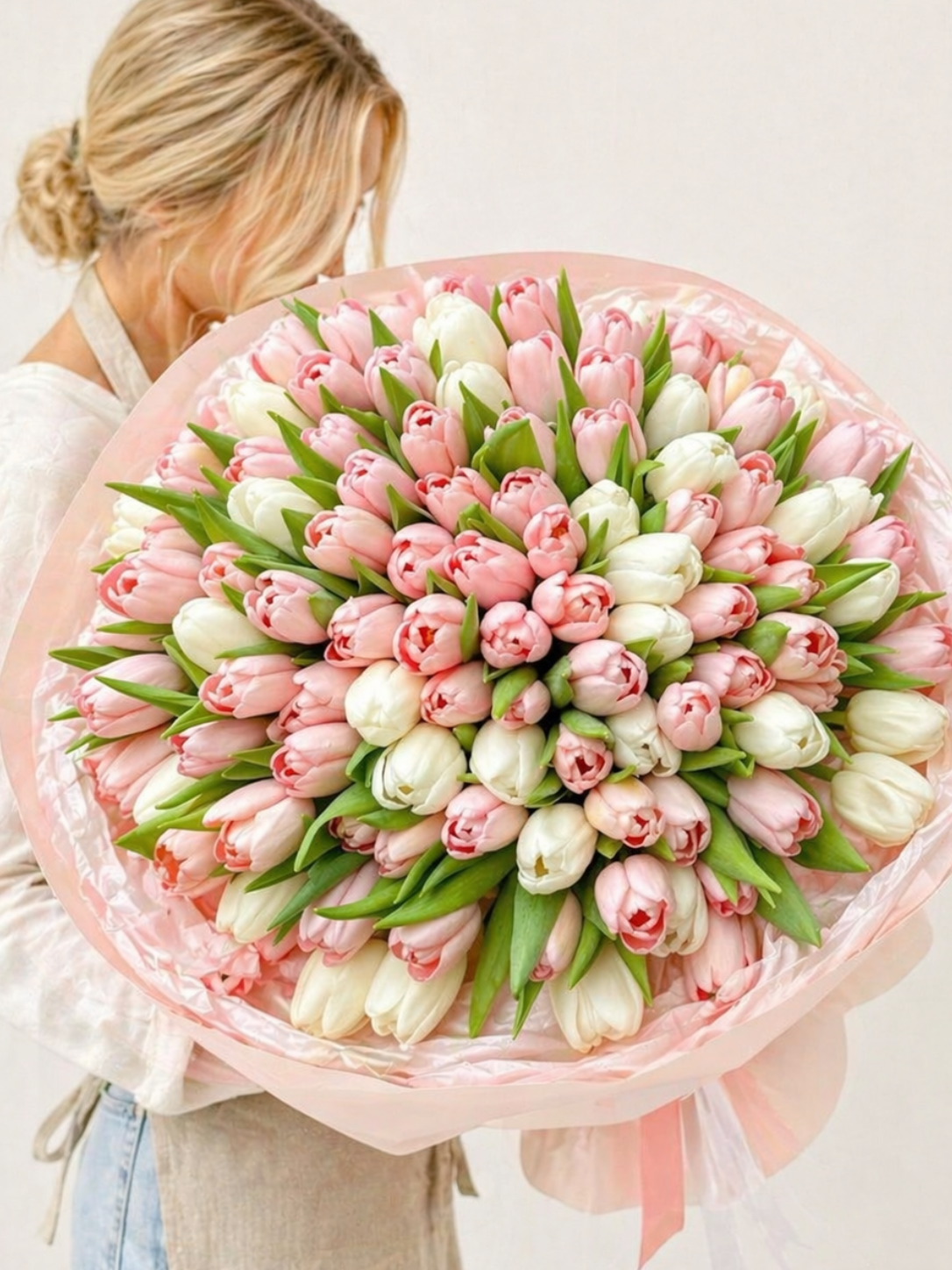 Bouquet of pink and white tulips from FSMIA with pierce veil design wrapped in pink paper